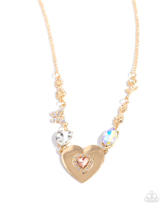 Paparazzi Accessories: Motivated Medley - Gold UV Shimmery Necklace