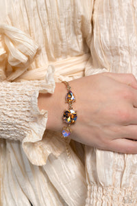 Paparazzi Accessories: Round Royalty Necklace and Twinkling Trio Bracelet - Gold Iridescent SET