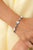 Paparazzi Accessories: Ethereal Empathy - White Iridescent Bracelet